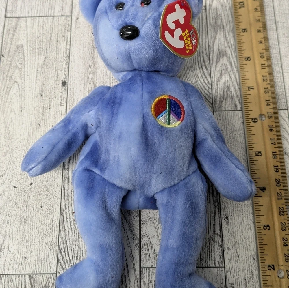 Ty Blue Plush Bear with Peace Emblem